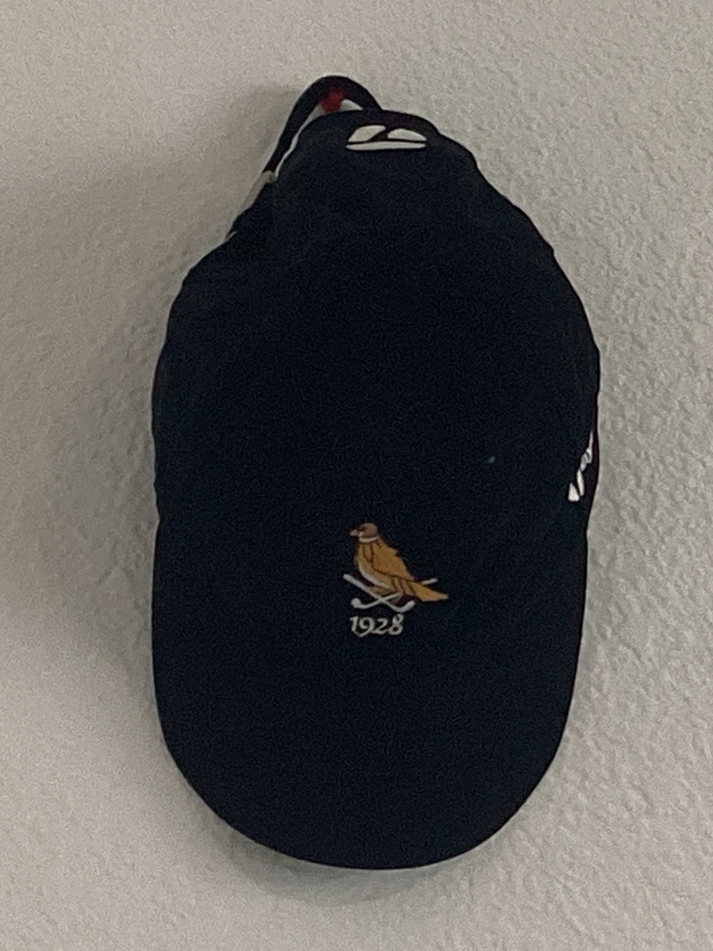 TaylorMade Black Baseball Cap with Yellow Embroidered Bird